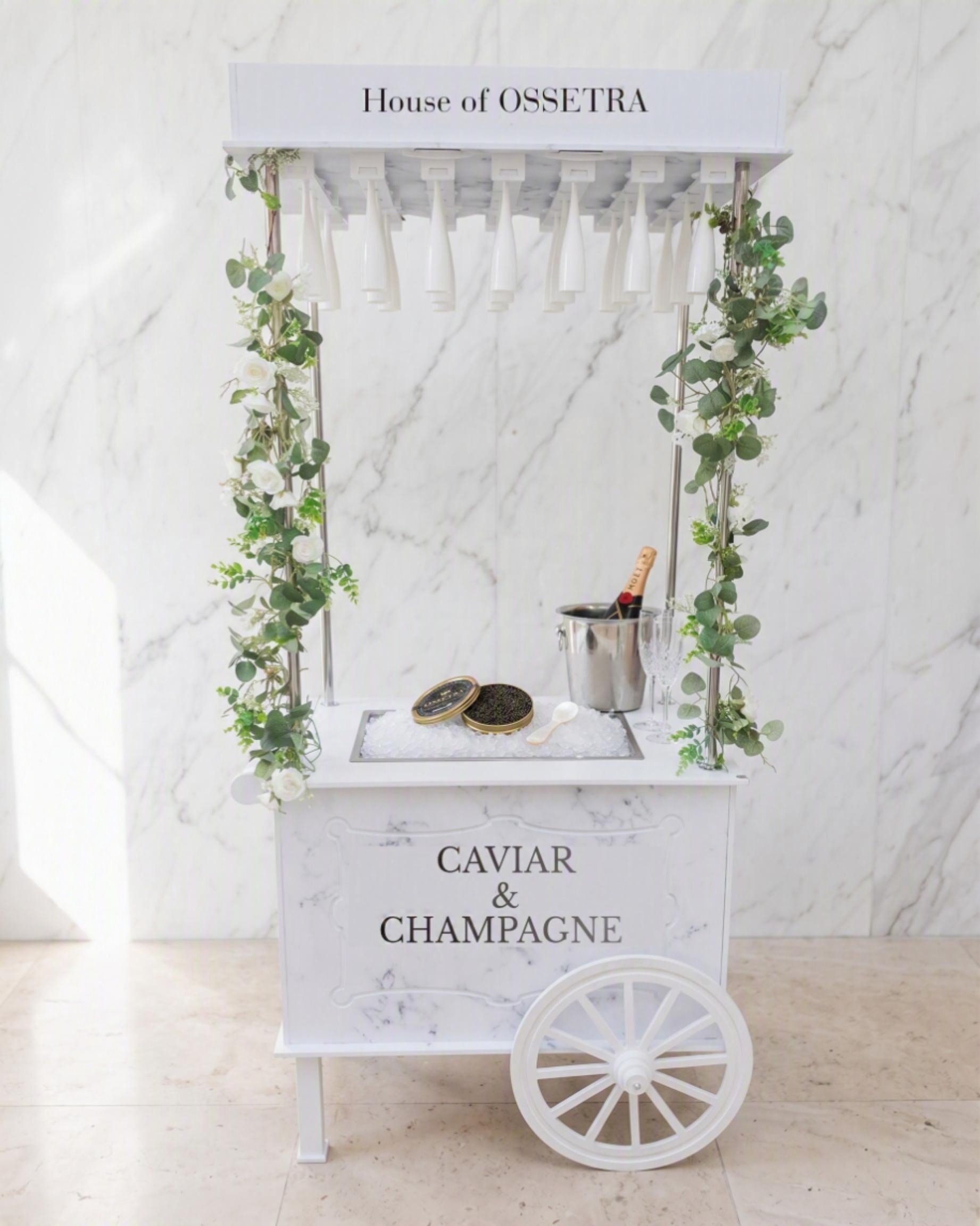 The House of Ossetra caviar and champagne cart